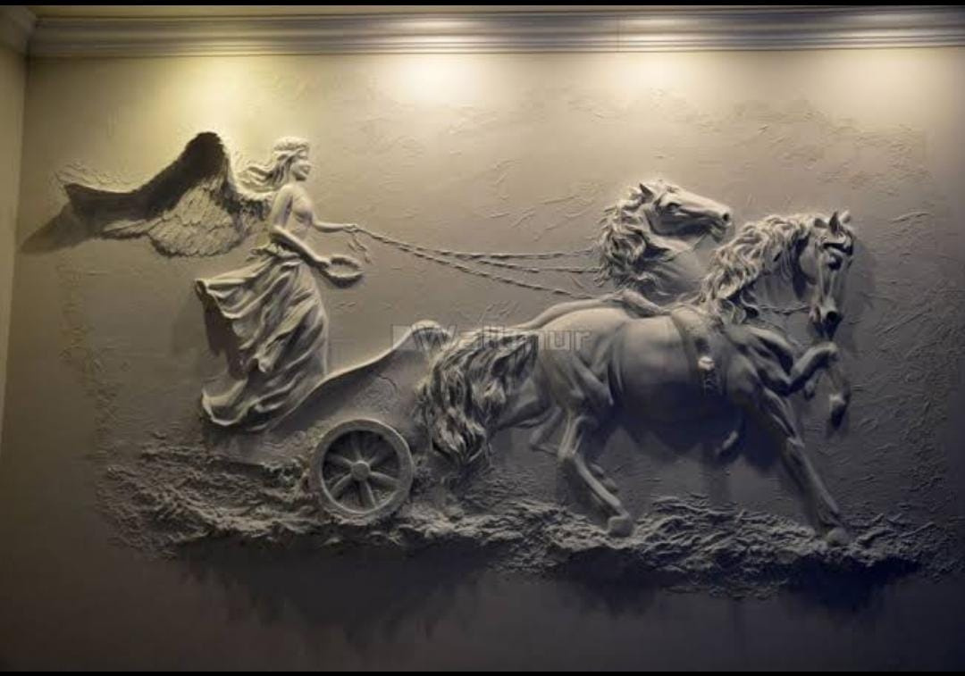 Stone carved wall relief sculpture