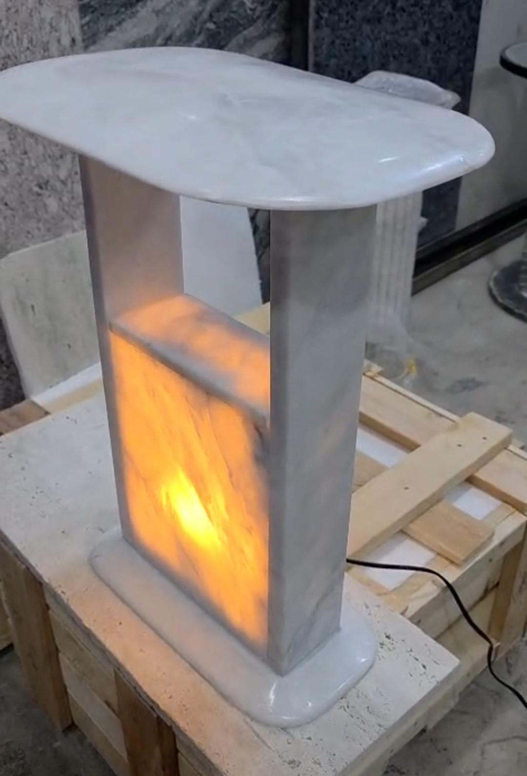 Backlit marble side table glowing Al-Hamd Granite workshop Karachi
