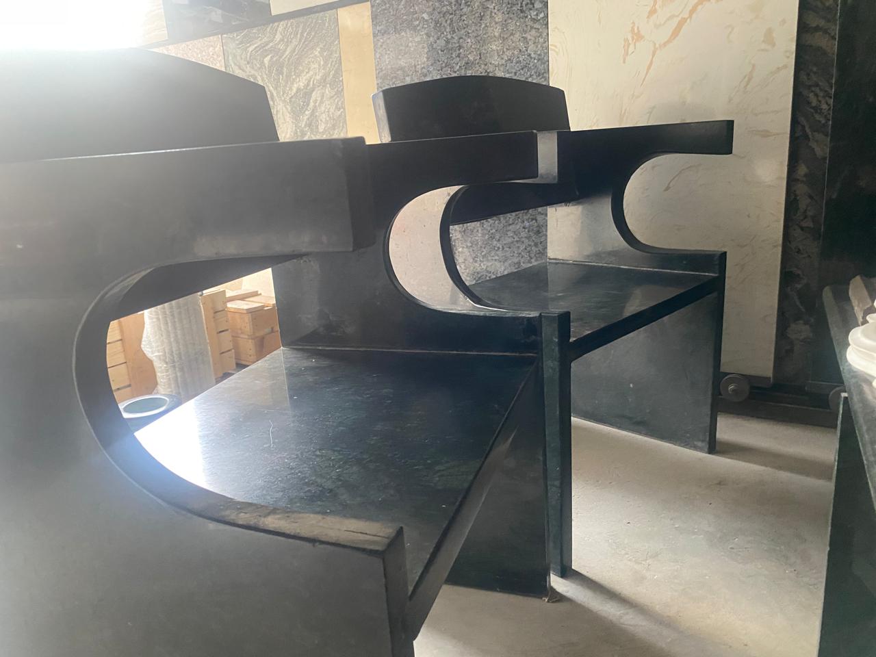 Black granite chairs seating crafted at Al-Hamd Granite showroom Karachi