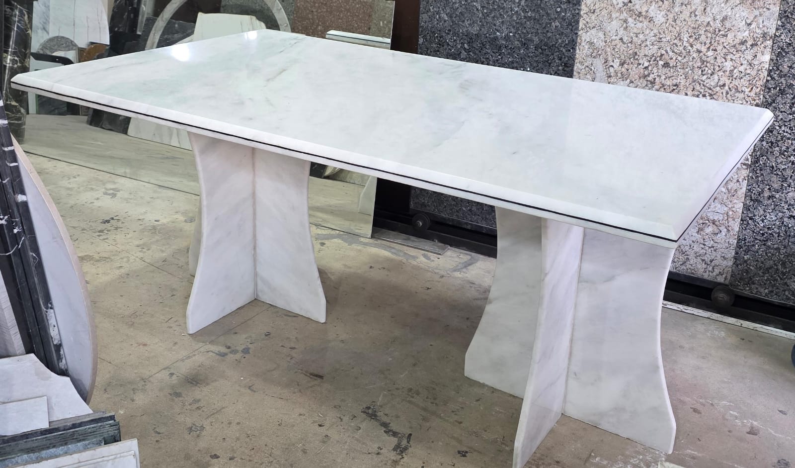 White marble dining table 42 x 72 inches with sculpted twin pedestal base Al-Hamd Granite Karachi